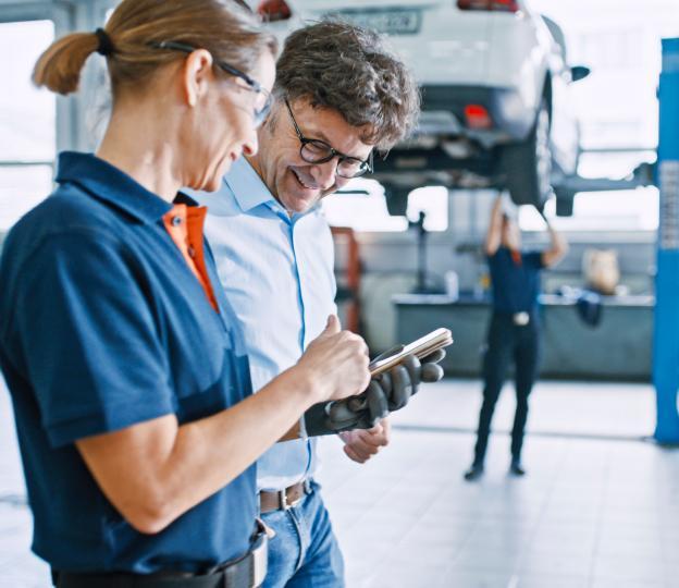 Service technician talking to customer